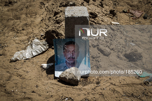 Many people are being burried with make-shift tombstones between houses as most graveyards in Gaza City became full after Israel intensified...