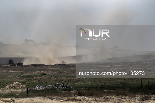 Israeli tanks seen along the border of Erez moving towards the north of Gaza Strip on July 20th, 2014 when fighting in the North intensified...