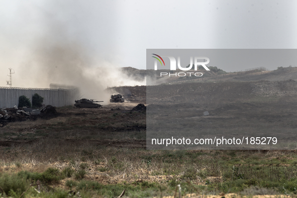 Israeli tanks seen along the border of Erez moving towards the north of Gaza Strip on July 20th, 2014 when fighting in the North intensified...