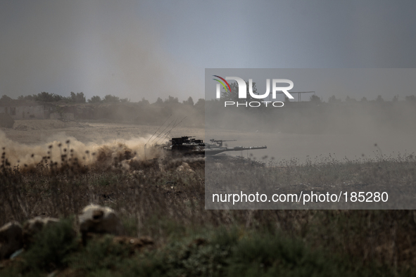 Israeli tanks seen along the border of Erez moving towards the north of Gaza Strip on July 20th, 2014 when fighting in the North intensified...