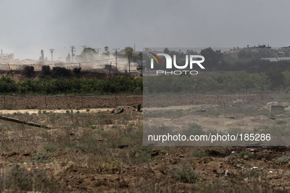 Israeli tanks moving into the northern village of Beit Hanoun in Gaza on July 20th, 2014.