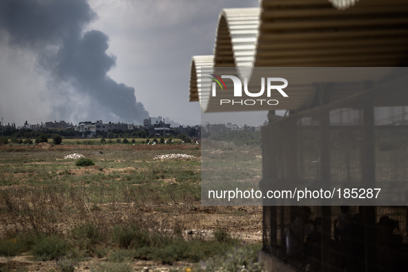 The northern village Beit Hanoun in Gaza seen from the Erez border crossing to Israel while being heavily targeted by tanks on July 20th, 20...