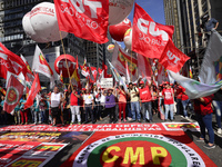 People take part in the Labour Day march held in downtown São Paulo, Brazil, on 01 May 2017. Labor Day or May Day is observed all over the w...