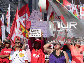 People take part in the Labour Day march held in downtown São Paulo, Brazil, on 01 May 2017. Labor Day or May Day is observed all over the w...