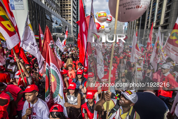 People take part in the Labour Day march held in downtown São Paulo, Brazil, on 01 May 2017. Labor Day or May Day is observed all over the w...