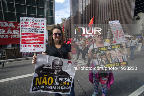 People take part in the Labour Day march held in downtown São Paulo, Brazil, on 01 May 2017. Labor Day or May Day is observed all over the w...