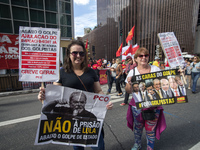 People take part in the Labour Day march held in downtown São Paulo, Brazil, on 01 May 2017. Labor Day or May Day is observed all over the w...