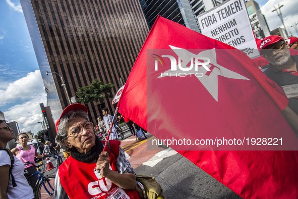 People take part in the Labour Day march held in downtown São Paulo, Brazil, on 01 May 2017. Labor Day or May Day is observed all over the w...