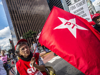 People take part in the Labour Day march held in downtown São Paulo, Brazil, on 01 May 2017. Labor Day or May Day is observed all over the w...