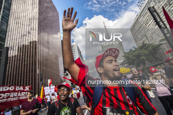 People take part in the Labour Day march held in downtown São Paulo, Brazil, on 01 May 2017. Labor Day or May Day is observed all over the w...