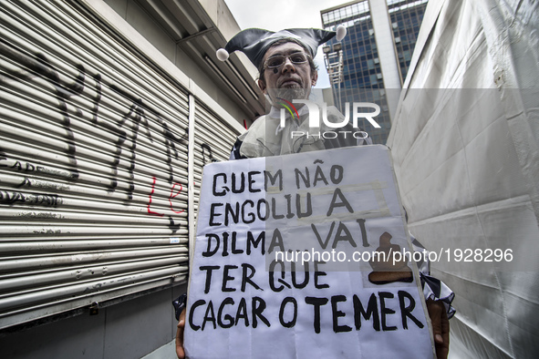 People take part in the Labour Day march held in downtown São Paulo, Brazil, on 01 May 2017. Labor Day or May Day is observed all over the w...