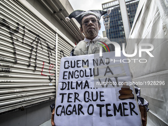 People take part in the Labour Day march held in downtown São Paulo, Brazil, on 01 May 2017. Labor Day or May Day is observed all over the w...