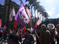 People take part in the Labour Day march held in downtown São Paulo, Brazil, on 01 May 2017. Labor Day or May Day is observed all over the w...