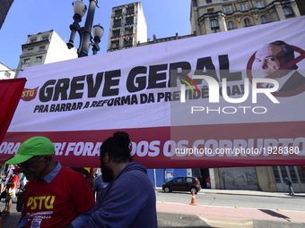 People take part in the Labour Day march held in downtown São Paulo, Brazil, on 01 May 2017. Labor Day or May Day is observed all over the w...