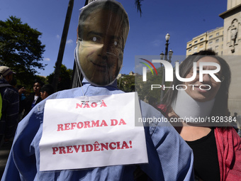 People take part in the Labour Day march held in downtown São Paulo, Brazil, on 01 May 2017. Labor Day or May Day is observed all over the w...