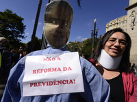 People take part in the Labour Day march held in downtown São Paulo, Brazil, on 01 May 2017. Labor Day or May Day is observed all over the w...