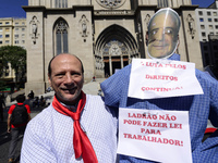 People take part in the Labour Day march held in downtown São Paulo, Brazil, on 01 May 2017. Labor Day or May Day is observed all over the w...