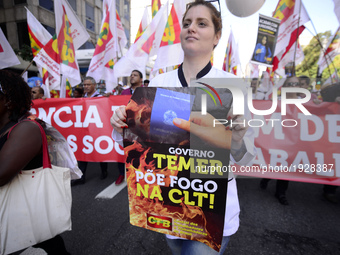 People take part in the Labour Day march held in downtown São Paulo, Brazil, on 01 May 2017. Labor Day or May Day is observed all over the w...