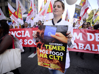 People take part in the Labour Day march held in downtown São Paulo, Brazil, on 01 May 2017. Labor Day or May Day is observed all over the w...