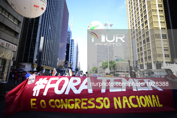 People take part in the Labour Day march held in downtown São Paulo, Brazil, on 01 May 2017. Labor Day or May Day is observed all over the w...