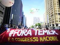 People take part in the Labour Day march held in downtown São Paulo, Brazil, on 01 May 2017. Labor Day or May Day is observed all over the w...