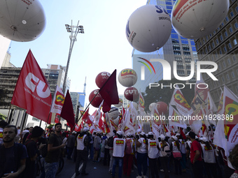 People take part in the Labour Day march held in downtown São Paulo, Brazil, on 01 May 2017. Labor Day or May Day is observed all over the w...