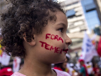 People take part in the Labour Day march held in downtown São Paulo, Brazil, on 01 May 2017. Labor Day or May Day is observed all over the w...