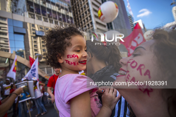 People take part in the Labour Day march held in downtown São Paulo, Brazil, on 01 May 2017. Labor Day or May Day is observed all over the w...