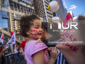 People take part in the Labour Day march held in downtown São Paulo, Brazil, on 01 May 2017. Labor Day or May Day is observed all over the w...