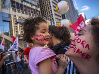 People take part in the Labour Day march held in downtown São Paulo, Brazil, on 01 May 2017. Labor Day or May Day is observed all over the w...