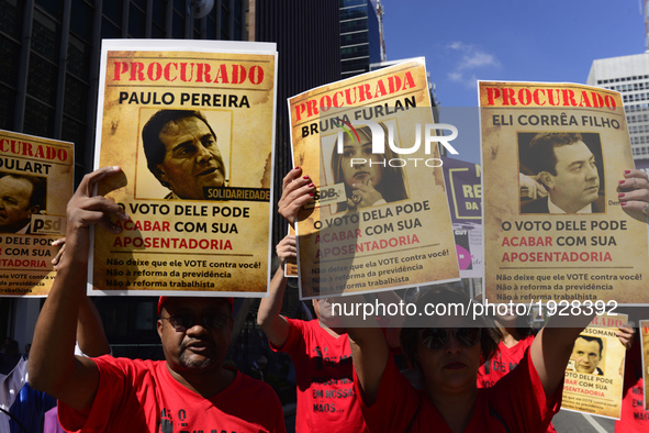 People take part in the Labour Day march held in downtown São Paulo, Brazil, on 01 May 2017. Labor Day or May Day is observed all over the w...