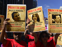 People take part in the Labour Day march held in downtown São Paulo, Brazil, on 01 May 2017. Labor Day or May Day is observed all over the w...