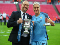 Nick Cushing manager of Manchester City and Steph Houghton of Manchester City WFC with Trophy
during The SSE FA Women's Cup-Final match betw...