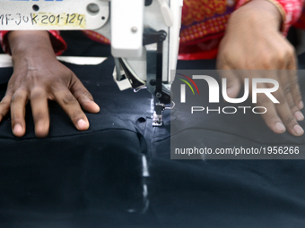 Garments worker working inside a factory in Gazipur in Bangladesh, on May 14, 2017.Bangladesh is the second largest apparel exporter in the...