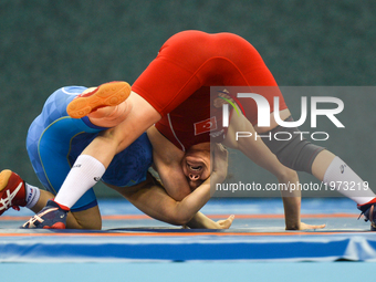 Aigul Nuralim of Kazakhstan competes against Burcu Kebic of Turkey in the Women's Freestyle 53kg Wrestling Preliminatory during Baku 2017 -...
