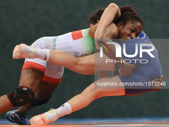Blessing Oborududu of Nigeria competes against Hafize Sahin of Turkey in the Women's Freestyle 63kg Wrestling final during Baku 2017 - 4th I...