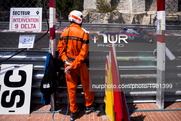 The marshal of Automobile club de Monaco seeing 55 SAINZ Carlos from Spain of Toro Rosso STR12 team Toro Rosso during the Monaco Grand Prix...