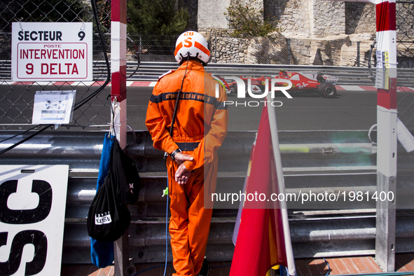 The marshal of Automobile club de Monaco seeing 07 RAIKKONEN Kimi from Finland of Ferrari SF70-H team scuderia Ferrari during the Monaco Gra...