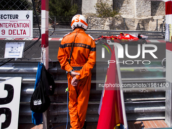 The marshal of Automobile club de Monaco seeing 07 RAIKKONEN Kimi from Finland of Ferrari SF70-H team scuderia Ferrari during the Monaco Gra...