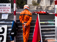 The marshal of Automobile club de Monaco seeing 07 RAIKKONEN Kimi from Finland of Ferrari SF70-H team scuderia Ferrari during the Monaco Gra...