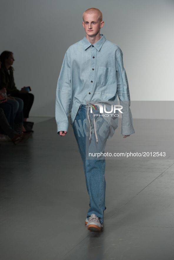 A model walks the runway at the Liam Hodges show during the London Fashion Week Men's June 2017 collections on June 9, 2017 in London, Engla...