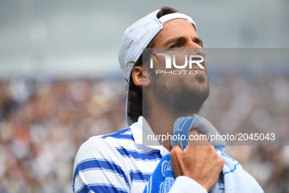 Feliciano Lopez of Spain looks dejected during the mens singles final against Marin Cilic of Croatia during day seven of the 2017 Aegon Cham...