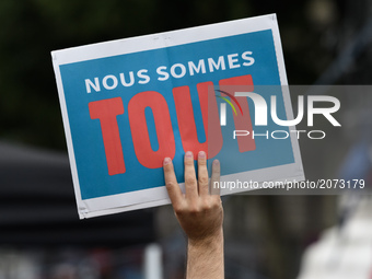 Protesters hold placards reading "We are everything" as they attend a demonstration against the French government's planned labour law refor...