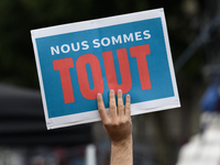 Protesters hold placards reading "We are everything" as they attend a demonstration against the French government's planned labour law refor...