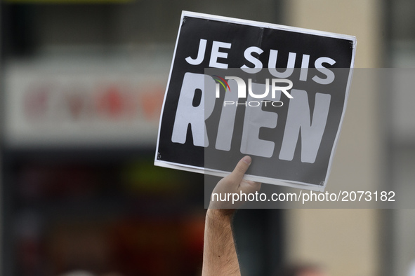 Protesters hold placards reading "I am nothing", as they attend a demonstration against the French government's planned labour law reforms o...