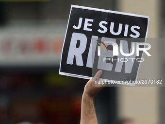 Protesters hold placards reading "I am nothing", as they attend a demonstration against the French government's planned labour law reforms o...