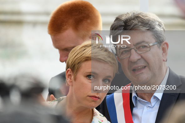 La France Insoumise (LFI) leftist party's parliamentary group president Jean-Luc Melenchon (R) and Clementine Autain  attend a demonstration...