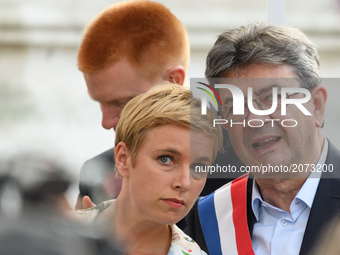 La France Insoumise (LFI) leftist party's parliamentary group president Jean-Luc Melenchon (R) and Clementine Autain  attend a demonstration...