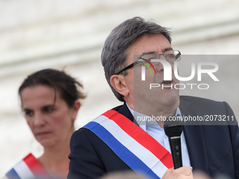 Jean-Luc Melenchon speaks as supporters of political party LFI take to the streets of Paris, France on July 12, 2017 to protest the recently...