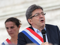 Jean-Luc Melenchon speaks as supporters of political party LFI take to the streets of Paris, France on July 12, 2017 to protest the recently...